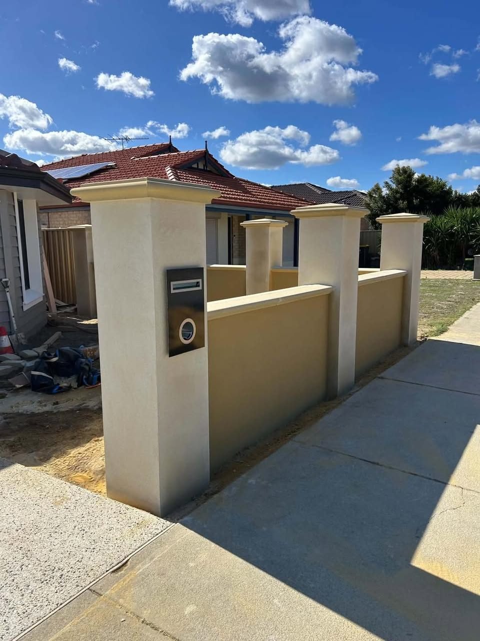 Cream sand finish boundary wall after rendering